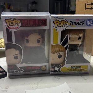 Funko Pop! Heroes and Rivals Action Figures - Black and Yellow